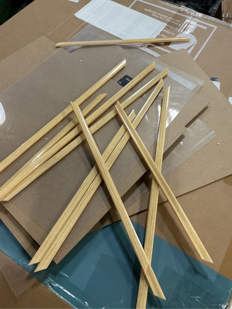Condition photo showing As Is for upsimples 12x16 picture frame natural 3 pack, scratch-proof poster frames 12 x 16 for photo gallery - slide-in strips, horizontal or vertical wall mounting natural 12x16