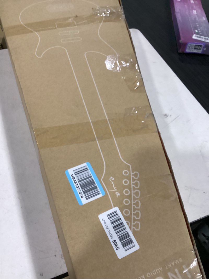Condition photo showing New/Like New for enya inspire 39" smart electric guitar - carbon fiber body with built-in 15w speaker, 20 tones & app control, 4 presets, bluetooth, gig bag included, 2-year warranty black inspire