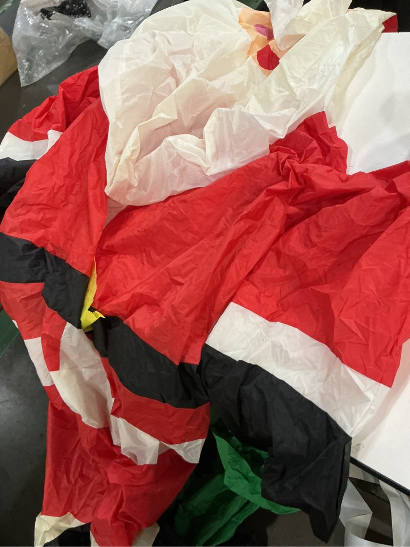 Condition photo showing As Is for 6 ft lighted christmas inflatable santa claus with large gift bag decoration