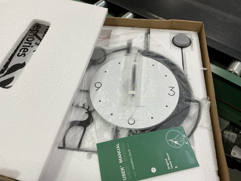 Condition photo showing Good Condition for FLEBLE Large Wall Clocks for Living Room Decor Modern Pendulum Wall Clock Silent Quartz Battery Operated Non-Ticking for Bedroom Kitchen Office 24inch Black Metal Deer Clock Wall Decor for Home Indoor 14*24 in