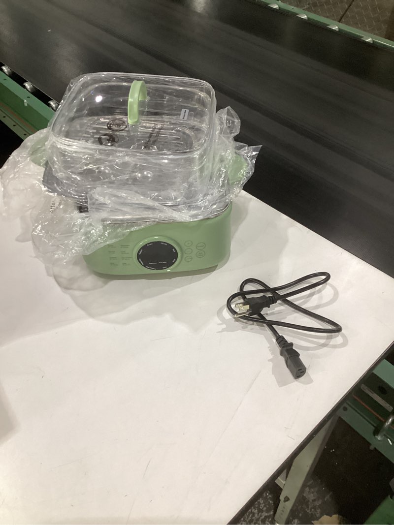 Condition photo showing Good Condition for multi function electric food steamer, size unknow, similar to stock photos, not tested