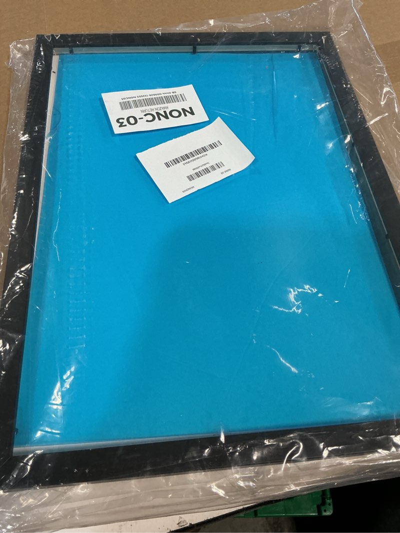 Condition photo showing As Is for poster palooza 13x18 frame black solid wood picture frame | 0.75 inch moulding width | includes uv acrylic plexiglass, foam board backing & hanging hardware black 0.56" wide