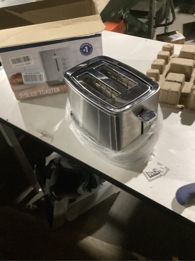 Condition photo showing Good Condition for GE 2 Slice Stainless Steel Toaster, Extra Wide Slots for Toasting Bagels, Breads, Waffles & More, 7 Adjustable Shade Settings, Removable Crumb Tray, Countertop Kitchen Essentials, 850 Watts 2-Slice Stainless Steel