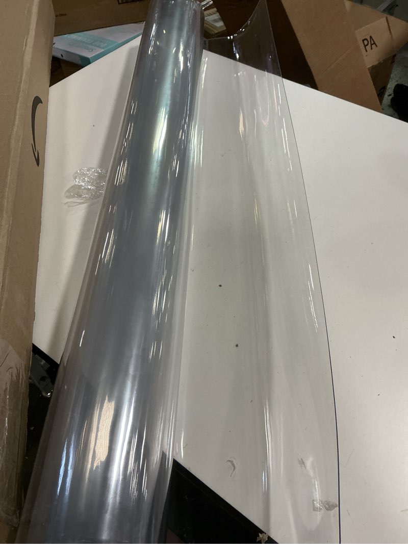 Condition photo showing As Is for LovePads Clear Table Cover Protector 36 x 60 Inch, 1.5mm Thick Plastic Table Cover, Table Protector for Dining Room Table, Waterproof Vinyl Tablecloth Table Pad Mat for Kitchen, Dresser, Writing Desk 36" x 60" Clear 1.5mm