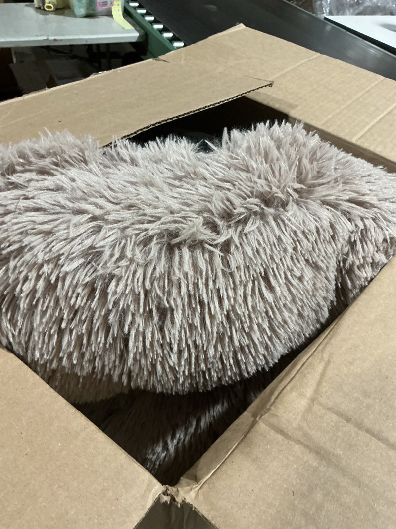 Condition photo showing As Is for PetJett Calming Large Dog Bed - 36'' Donut Dog Beds, Anti-Slip & Washable Large Round Bed, Fluffy Faux Fur Pet Bed, Super Soft Anti-Anxiety Premium Comfort Bed, Fits Dogs up to 100 lbs - Beige Beige Large - 36”L x 36”W x 10”Th