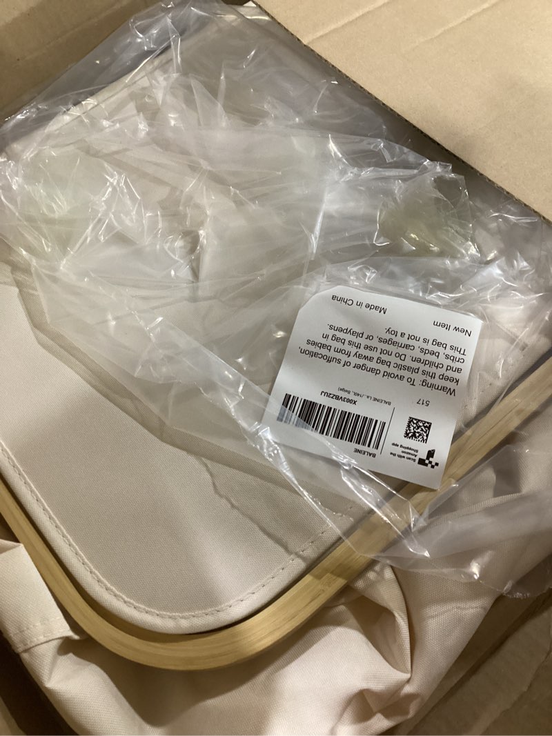 Condition photo showing As Is for BALEINE Laundry Hamper with Lid, Tall Laundry Baskets with Bamboo Pull Handles, Large Laundry Bin with Internal Support (36 Gal/140L, Beige) 140 liters Beige