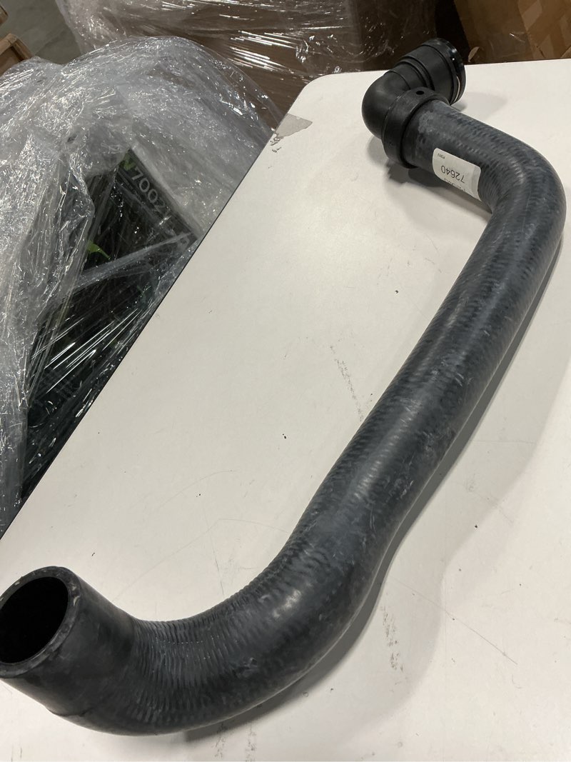 Condition photo showing As Is for dayco 72640 curved radiator hose