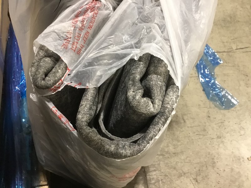 Condition photo showing As Is for Mohawk Home 6' x 9' Non Slip Grip Rug Pad 1/4" Thick Dual Surface Felt Cushion + Rubber Gripper - Safe for All Floors 1/4 Inch Dual Surface Rug Pad 6' x 9' (Rectangular)