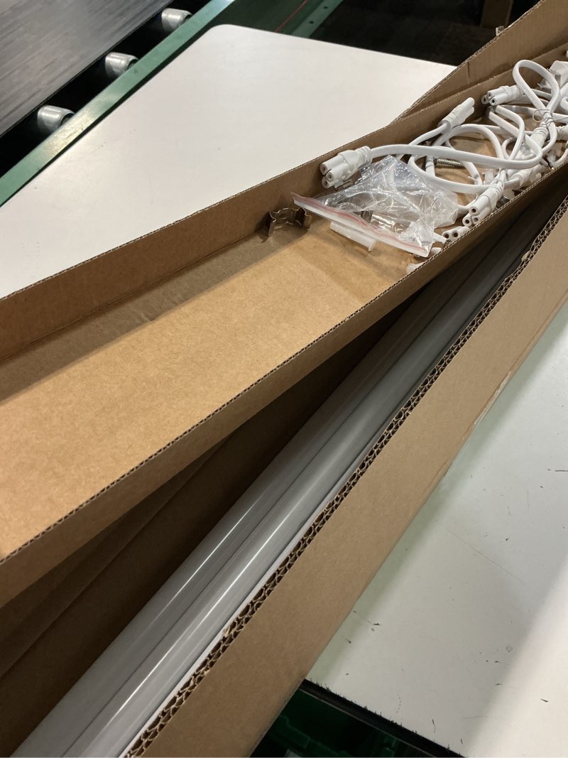 Condition photo showing Good Condition for pak 4ft led shop lights, 2300lm 6500k cool white, 20w energy efficient linkable ceiling and under cabinet lighting, t5 integrated utility fixture for garage, workshop, basement, fcc certified, 4 pack white 4ft 6500k-4 pack