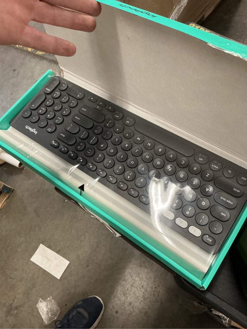 Condition photo showing New/Like New for logitech k780 full-size wireless scissor keyboard