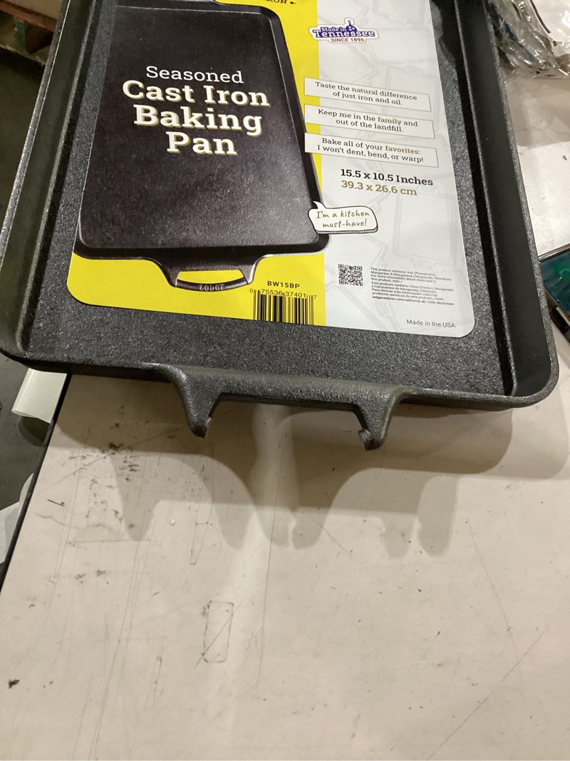 Condition photo showing As Is for lodge cast iron baking pan