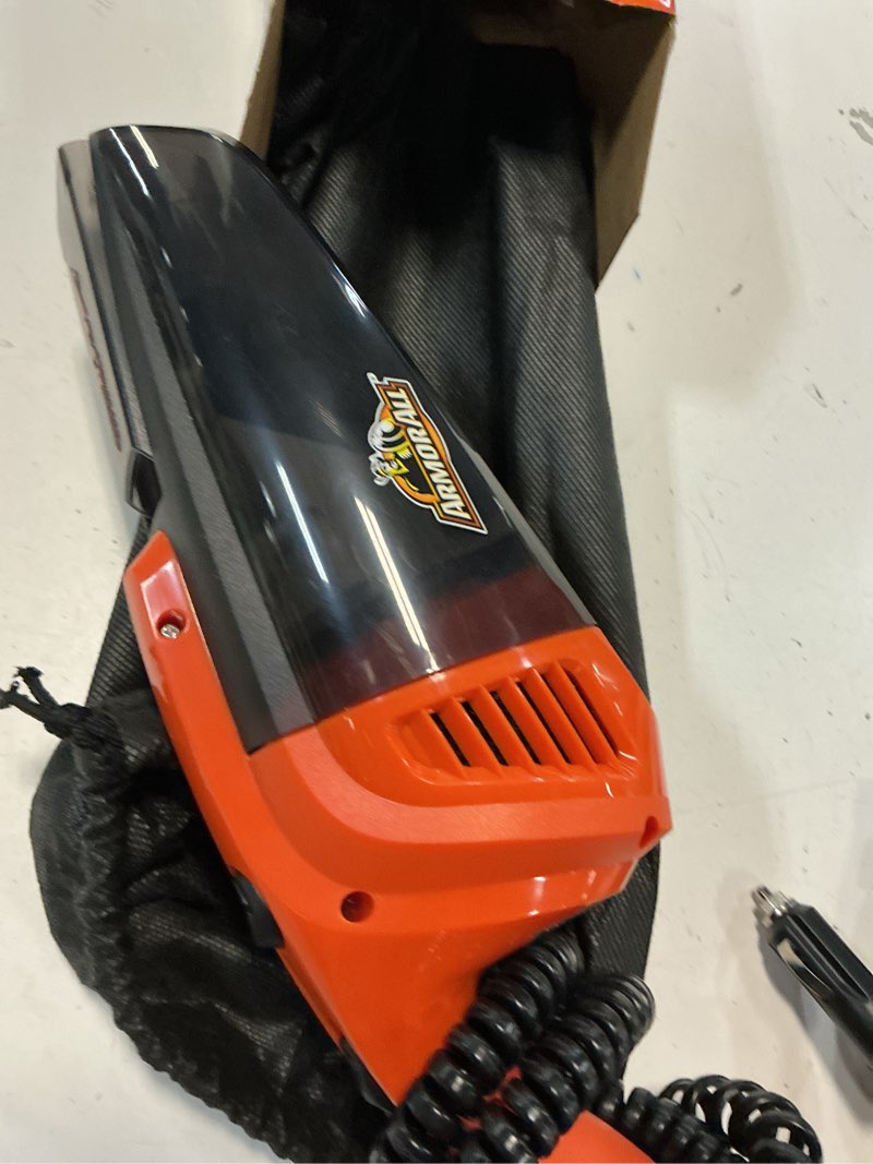 Condition photo showing As Is for armor all 12v handheld car vacuum aa12v1 0902