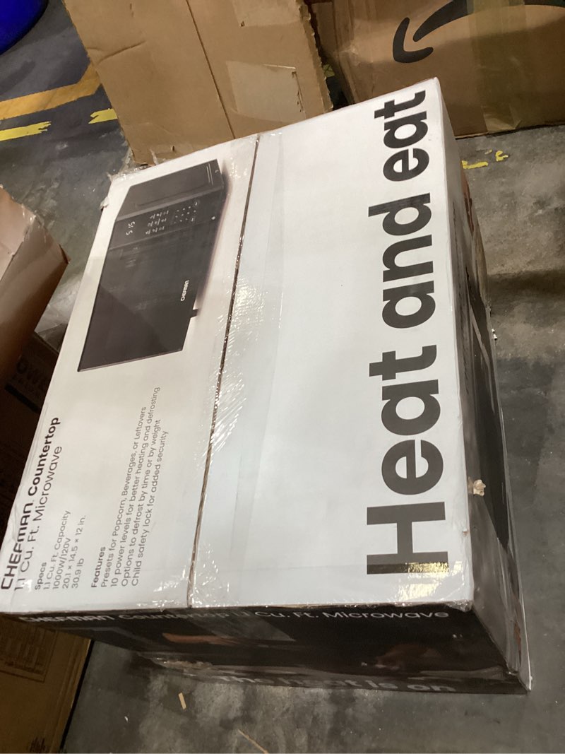Condition photo showing As Is for countertop microwave