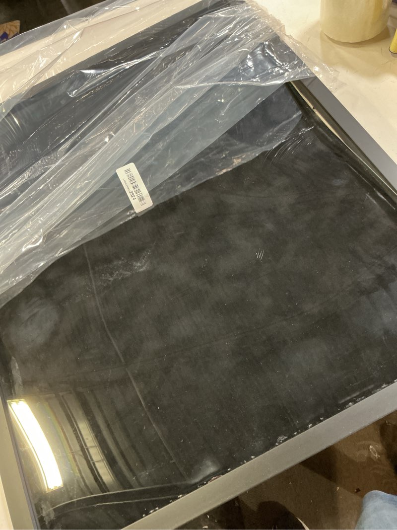 Condition photo showing As Is for 20x24 shadow box frame black wood | with a 3/4" usable display depth | includes a black real suede texture acid-free backing board, uv resistant acrylic, and hanging hardware