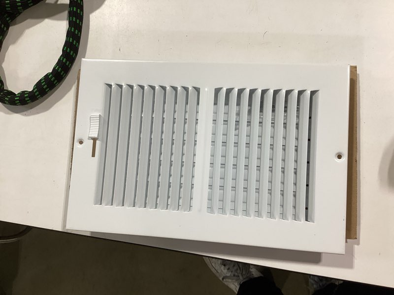 Condition photo showing Good Condition for reliabilt 10-in x 6-in 2-way steel white sidewall/ceiling register