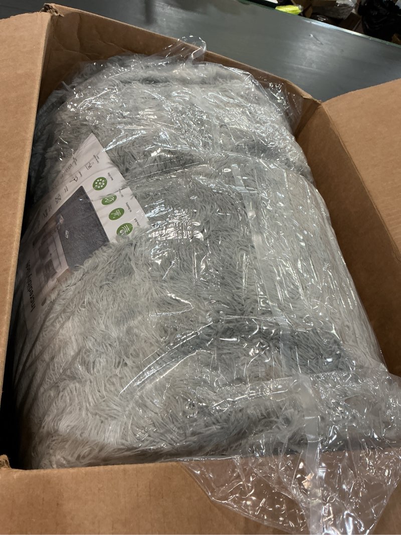 Condition photo showing Good Condition for CAIYUECS Shag Area Rug,Indoor Ultra Soft Fluffy Plush Rugs for Bedroom Living Room, Non-Skid Modern Nursery Faux Fur Rugs for Kids Room Home Decor (Tie-Dyed Light Gray, 5x7 Feet) Tie-dyed Light Gray 5' x 7' (Rectangular)