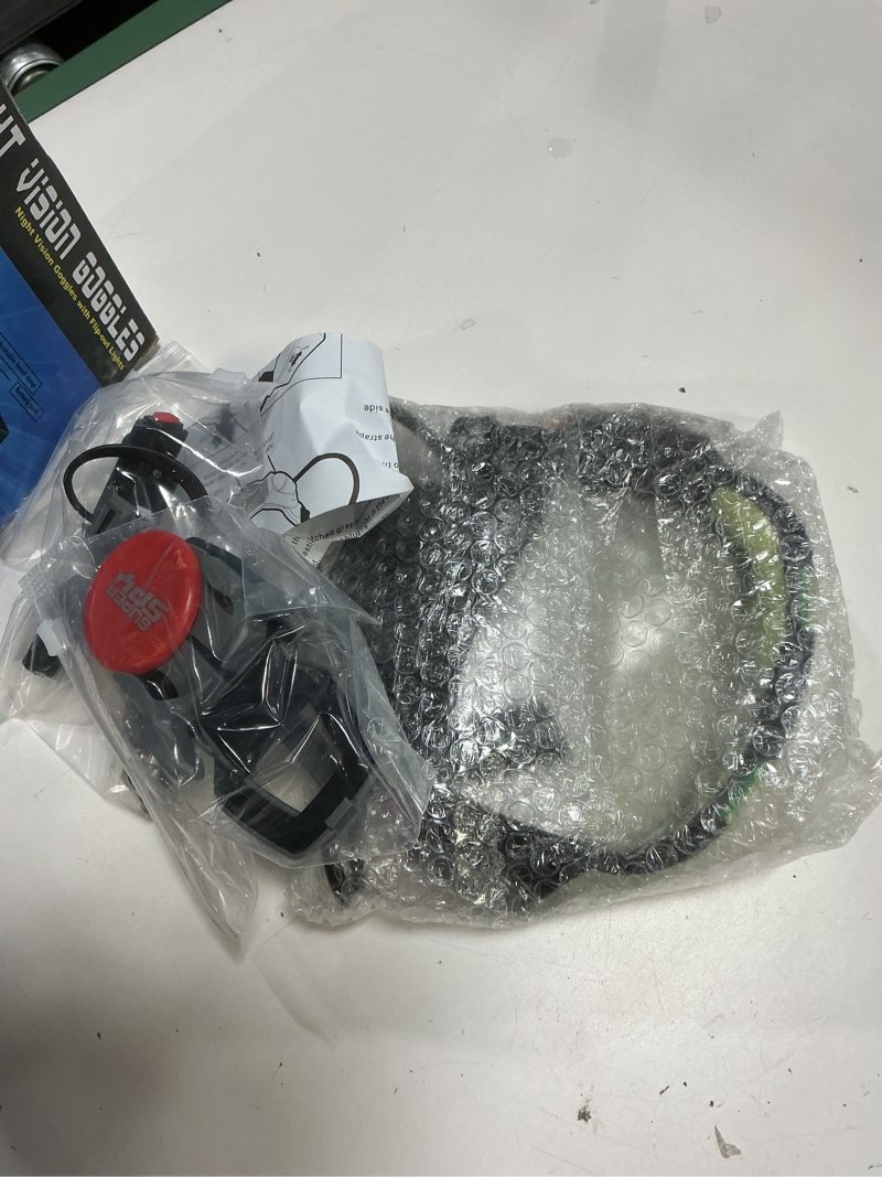 Condition photo showing item condition for Kids Night Vision Goggles Spy Kit, 4 Pcs Spy Gear Toys Set, Cool Night Mission Goggles with Flip-Out Light/Invisible Ink Pen/Ear Light/Frisbee Shooter, Gifts for Kids 5-12 Boys Girls 4 Pcs Spy Kit