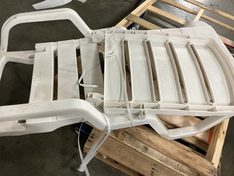 Condition photo showing As Is for adams manufacturing stackable white plastic frame stationary chaise lounge chair(s) with slat seat