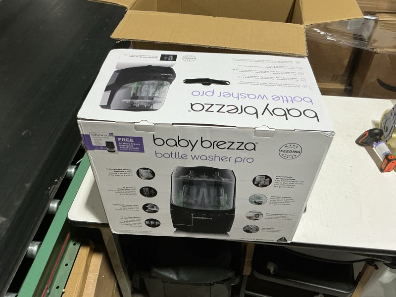 Condition photo showing New/Like New for baby brezza bottle washer pro - baby bottle washer, sterilizer + dryer - all in one machine cleans baby essentials like bottles + pump parts – appliance to replace bottle brushes & drying racks, black