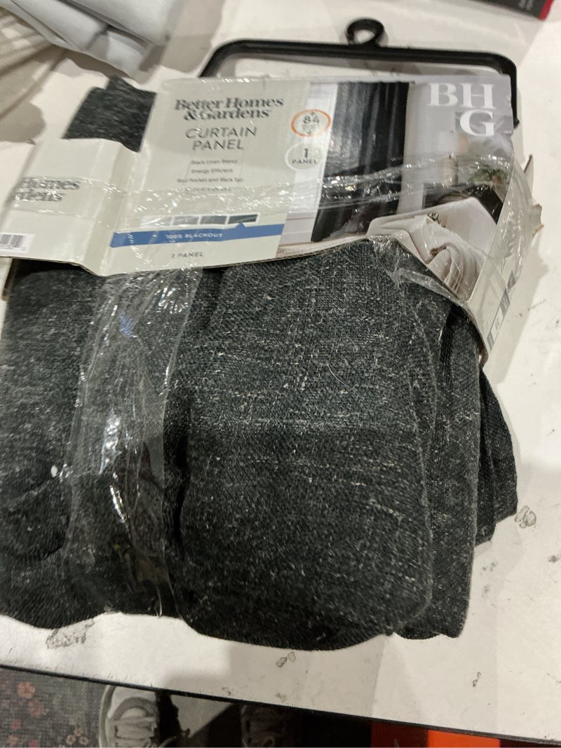 Condition photo showing As Is for better homes & gardens 100% blackout linen blend single curtain  50x84 rich black