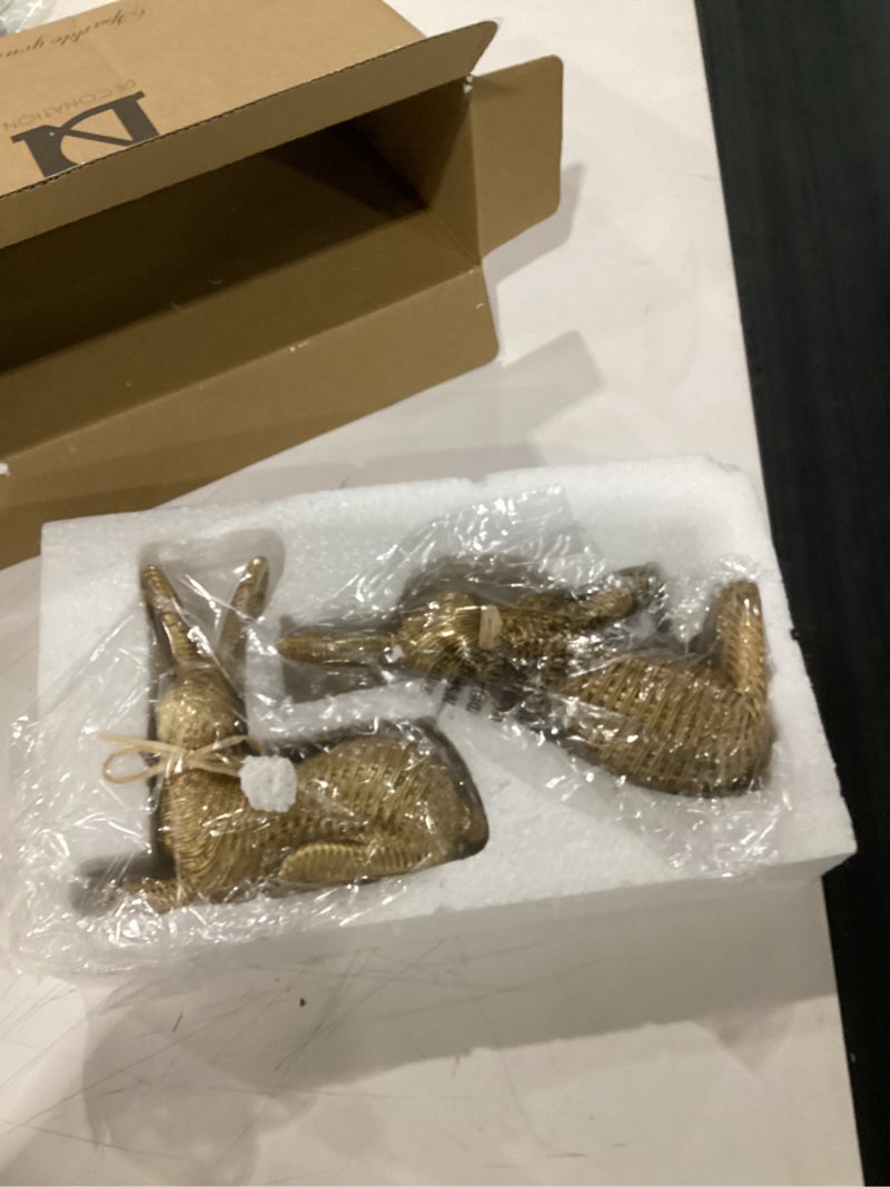 Condition photo showing New/Like New for dn deconation easter decorations bunny figurines set, rattan effect resin gold bunnies standing & lying with bow, farmhouse spring tabletop decor for mantel shelf office home gift gold rattan set of 2