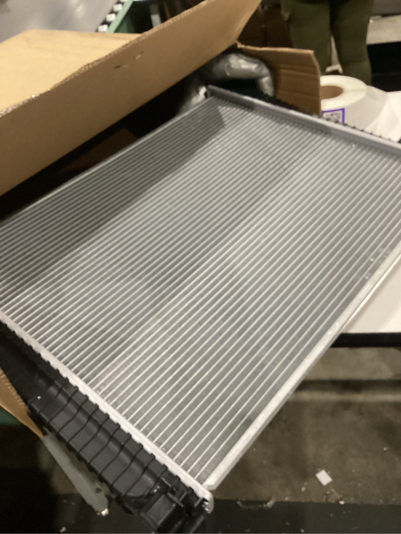 Condition photo showing As Is for tyc 13200 radiator compatible with 2011-2016 jeep grand cherokee