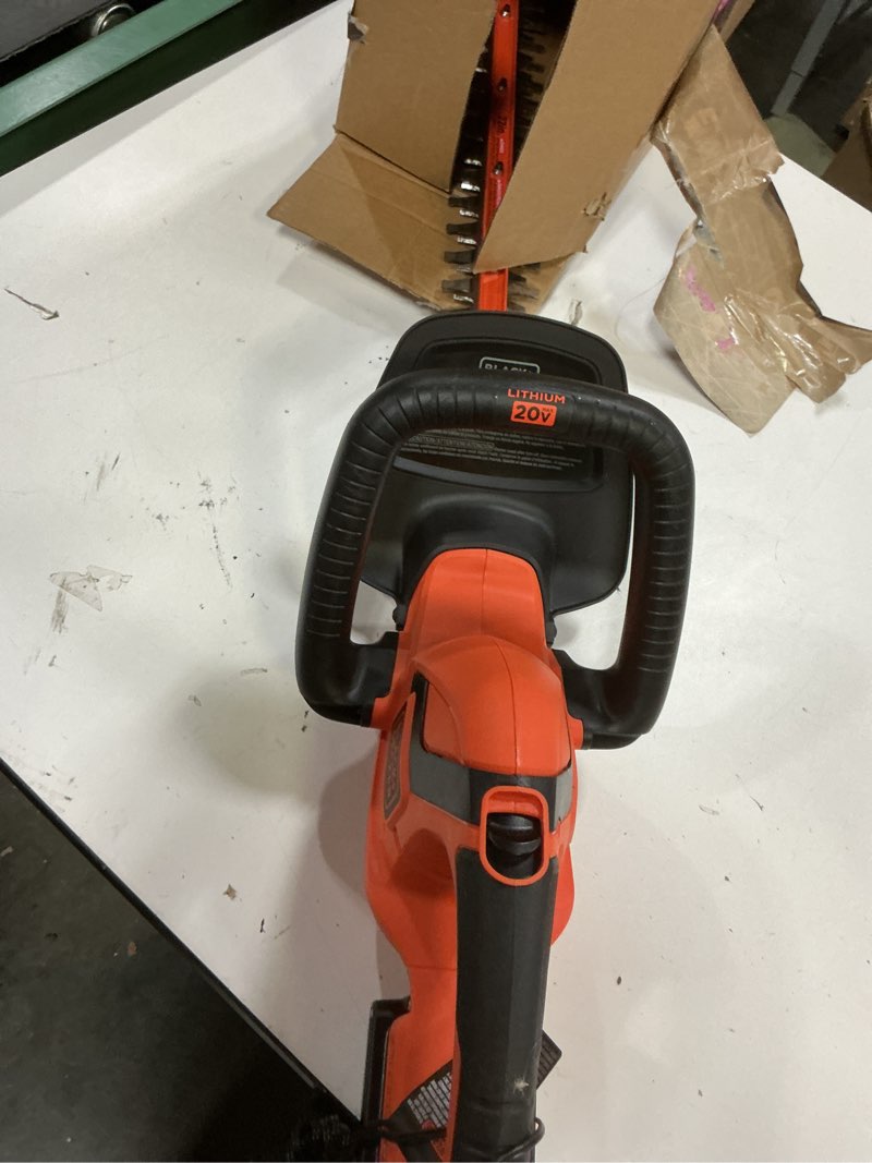 Condition photo showing As Is for black+decker 20v max cordless hedge trimmer, battery and charger included, 22 inch steel blade lightweight bush trimmer, soft grip, less vibration (lht2220)