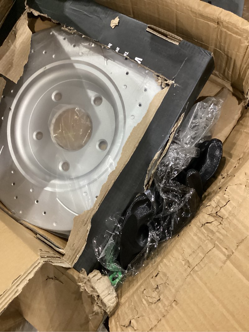 Condition photo showing As Is for rear disc rotors + brake pads 53069+d1596 for dodge grand caravan town & countryrear