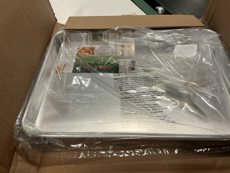 Condition photo showing Good Condition for Nordic Ware - 43172AMZM Nordic Ware Half Sheet with Oven Safe Nonstick Grid, 2 Piece Set, Natural Half Sheet with Grid Natural