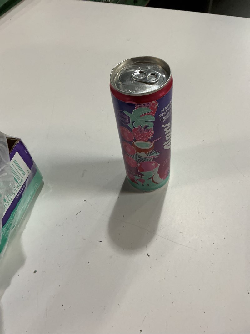 Condition photo showing Good Condition for (BB/09/2027)( incomplete) Alani Nu HAWAIIAN SHAVED ICE, Sugar Free, Low Calorie Energy Drinks, 200mg Caffeine, Biotin, B Vitamins, Zero Sugar, 10 Calories, 12 Fl Oz Cans, 24 Pack Hawaiian Shaved Ice 12 Fl Oz (Pack of 24)