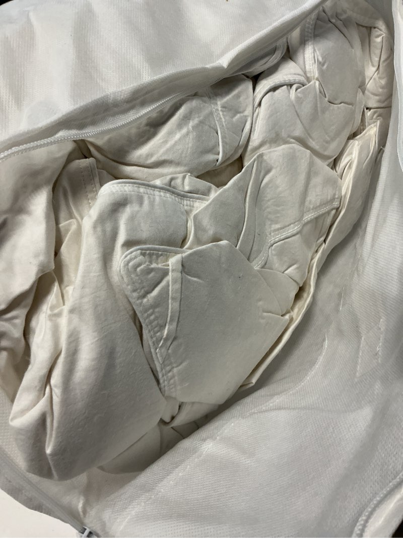 Condition photo showing As Is for ultra warm premium down comforter, twin, down