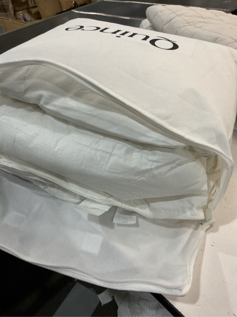 Condition photo showing Good Condition for quince premium down alternative comforter color:white size twin