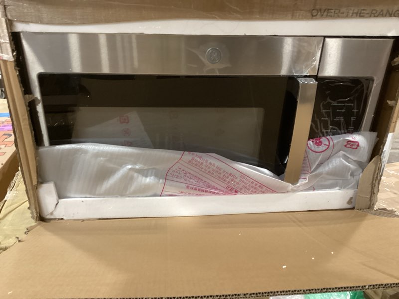 Condition photo showing As Is for ge jvm3160rfss 30" otr microwave, 1.6 cu ft, 1000w, 300 cfm hood vent, led lighting, auto defrost, easy mount install, stainless steel