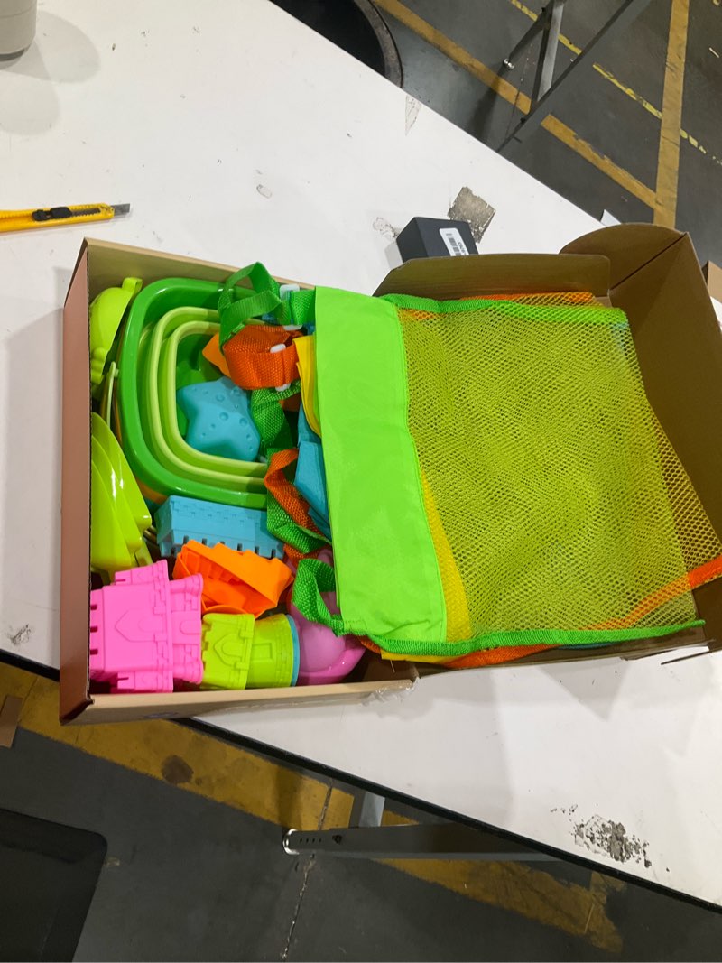 Condition photo showing Good Condition for dreamon beach toys for kids 3-10, collapsible sand toys include 3 pack foldable buckets with mesh bag, 24 pcs beach mold and shovels molds, travel sandbox beach toys for toddler 3*mesh bag