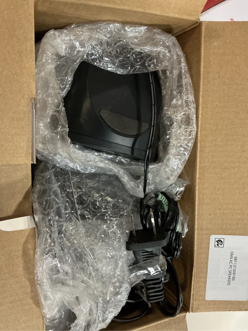 Condition photo showing As Is for onn ac powered computer speakers with volume and bass controls, 7.32" height