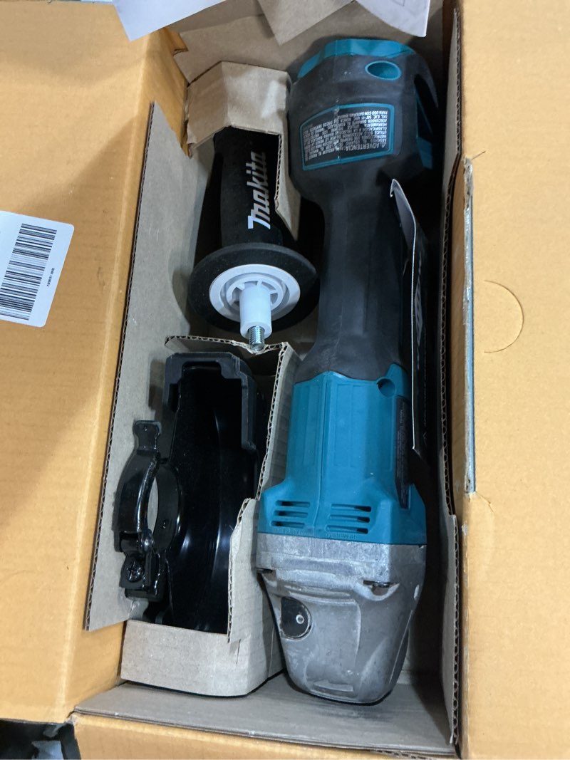 Condition photo showing As Is for makita xag04z 18v lxt® lithium-ion brushless cordless 4-1/2” / 5" cut-off/angle grinder, tool only
