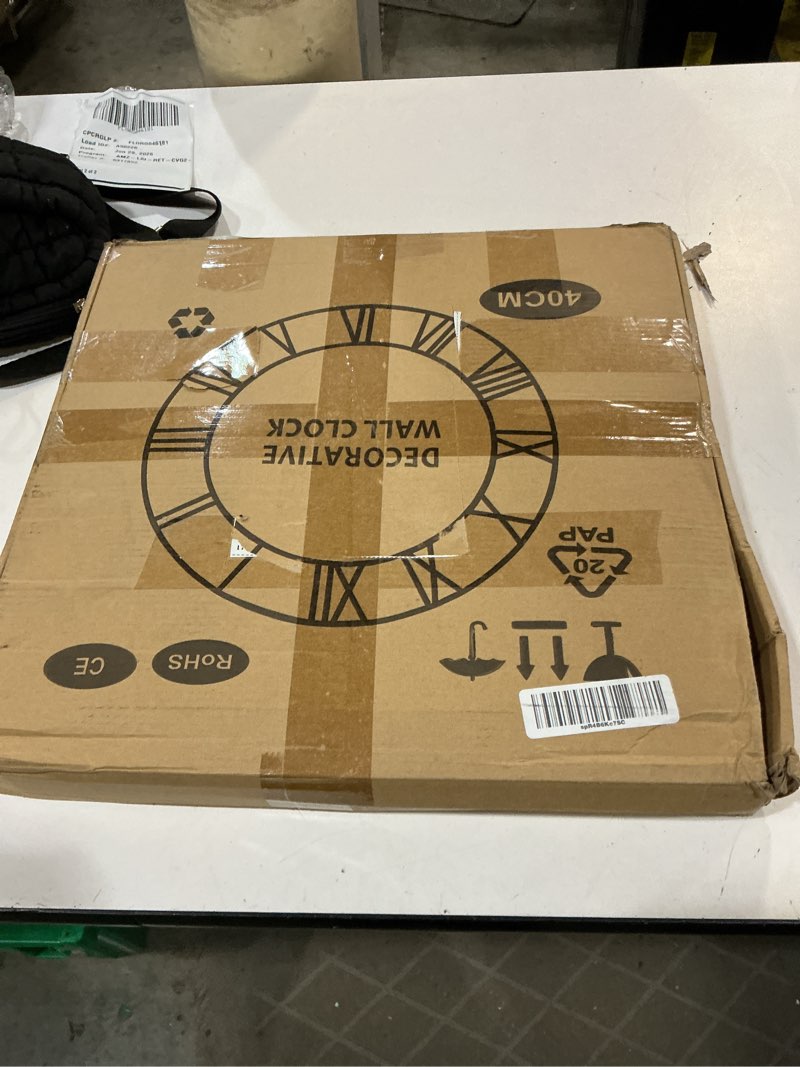Condition photo showing New/Like New for leike large wall clock, 16" silent non-ticking, battery operated, oversized, decorative retro black metal clock for living room,farmhouse, dinner room,indoor, outdoor decor(40cm, black arabic number) 16 inch black-arabic number
