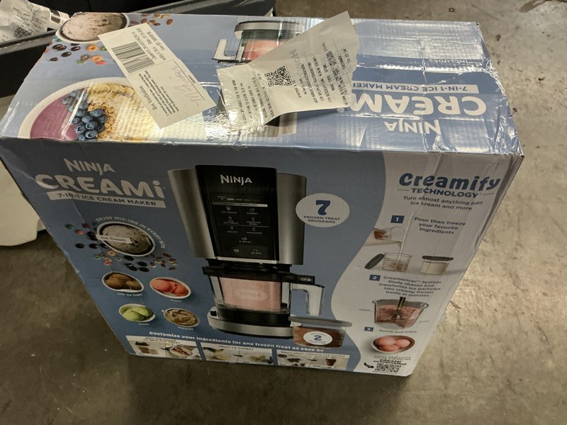 Condition photo showing As Is for ninja creami ice cream maker, for mix-ins, milkshakes, sorbet, 5 one-touch programs, (2) 16 oz pint containers & lids, nc300wh white