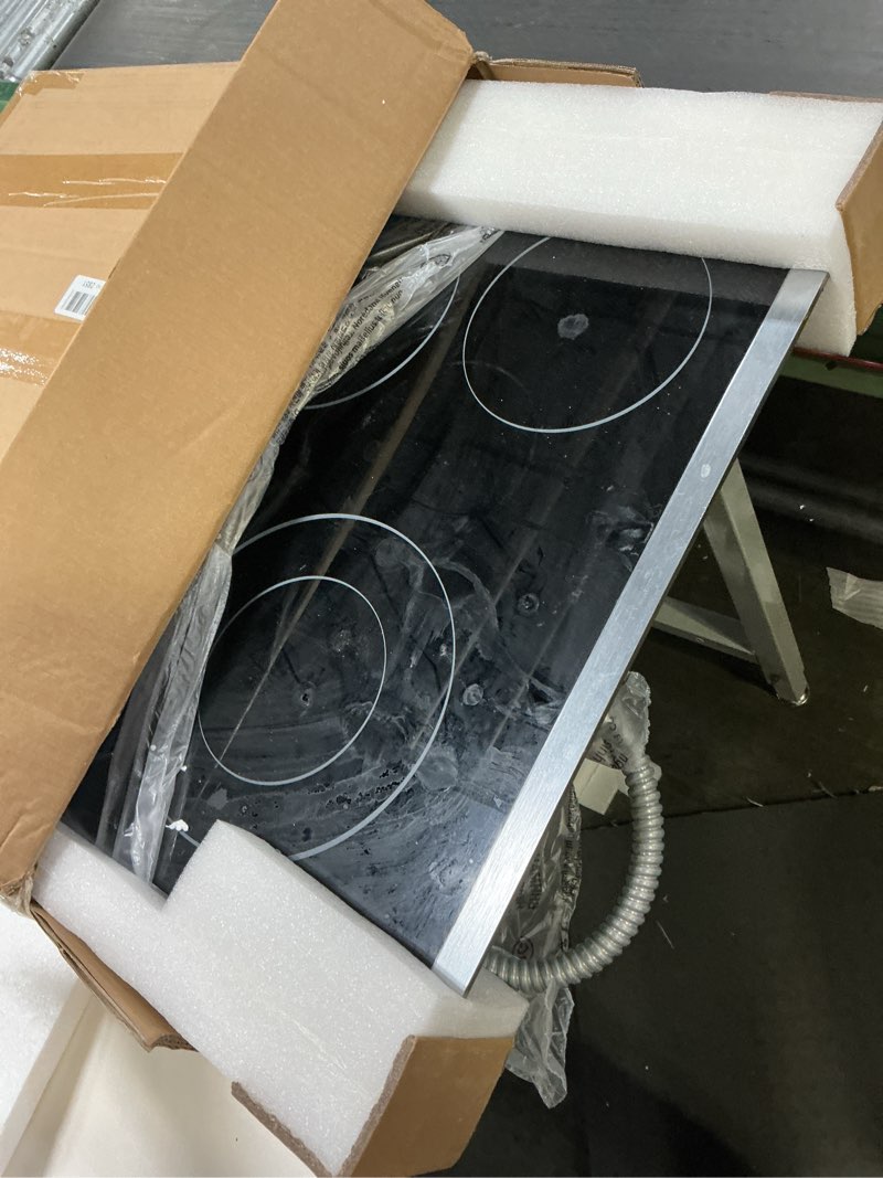 Condition photo showing As Is for 2 Burner Electric Cooktop 120V, 12 Inch Stove Top Burner 2000W, Double Burner Electric Stove with Knob Control, 9-Level Heat, Overheat Protection, High-Temp Alarm, 120V UL Plug
