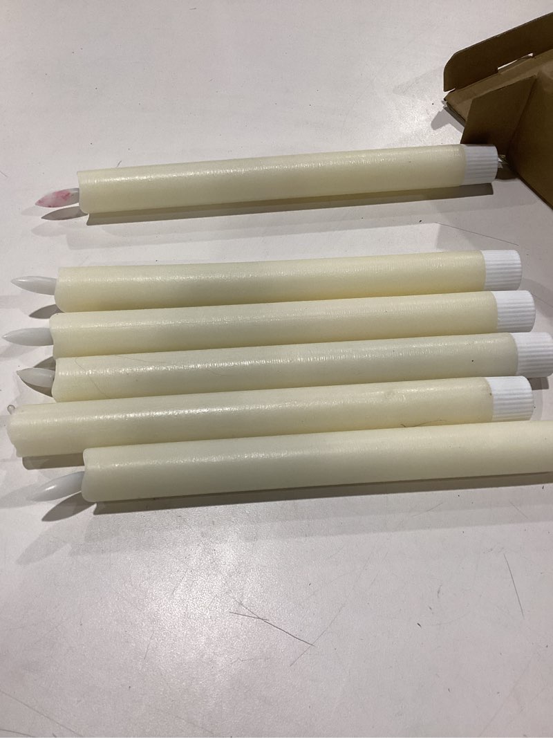 Condition photo showing As Is for genswin flameless ivory taper candles flickering with 10-key remote, battery operated led warm 3d wick light window candles real wax pack of 6, christmas home wedding decor(0.78 x 9.64 inch) 6-ivory
