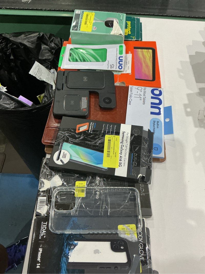 Condition photo showing As Is for assorted cellphone/tablet/laptop case covers & accessories
