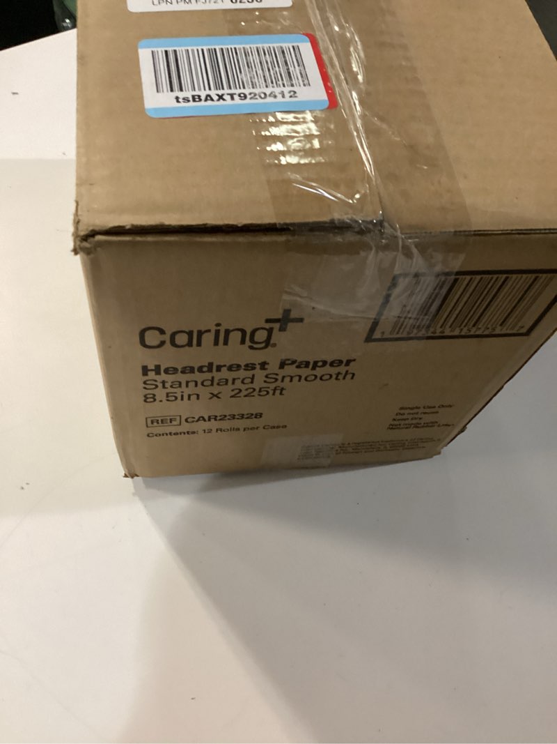 Condition photo showing New/Like New for caring headrest exam table paper, smooth, 8.5" x 225", 12 rolls/case, disposable medical table paper for chiropractors, massage therapists & physical therapy offices, hygienic surface protection