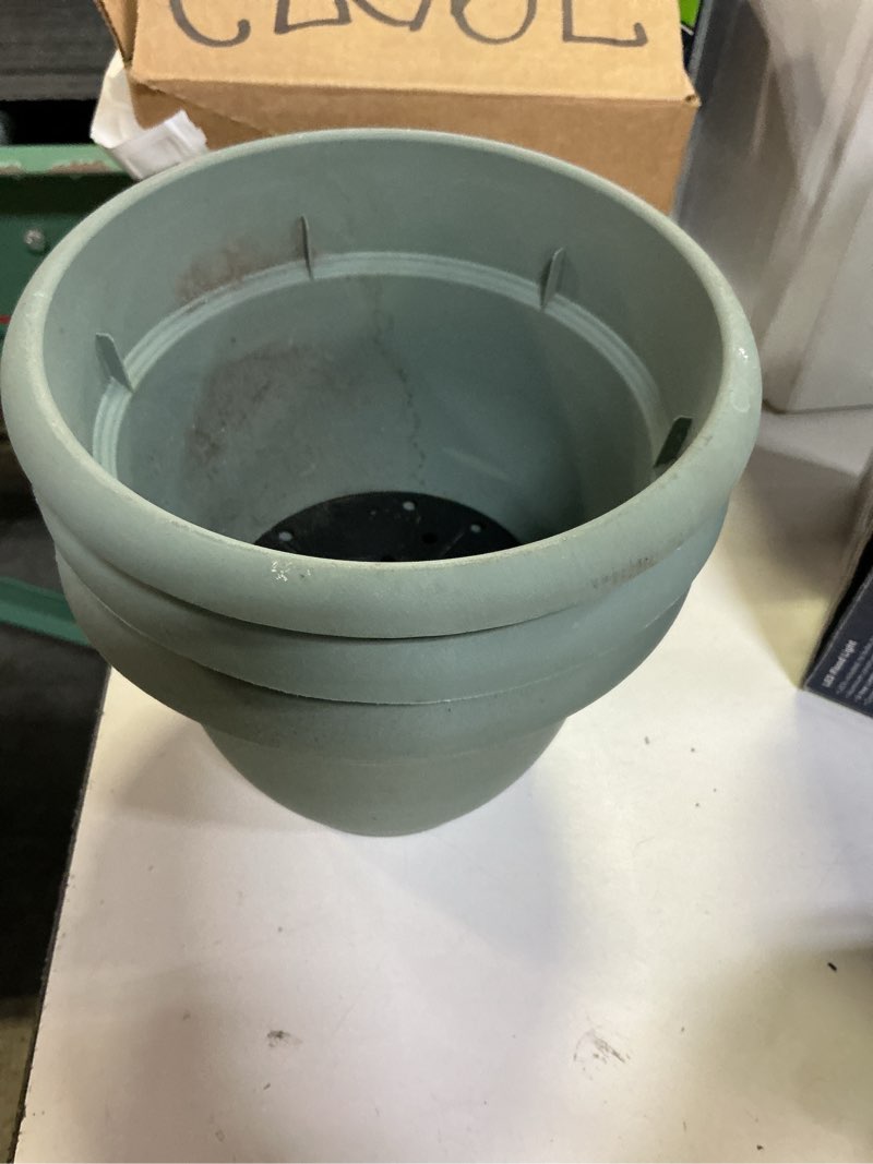 Condition photo showing As Is for bloem round 6.5-in w small green plastic indoor/outdoor planter with drainage holes self watering(pack de 3)