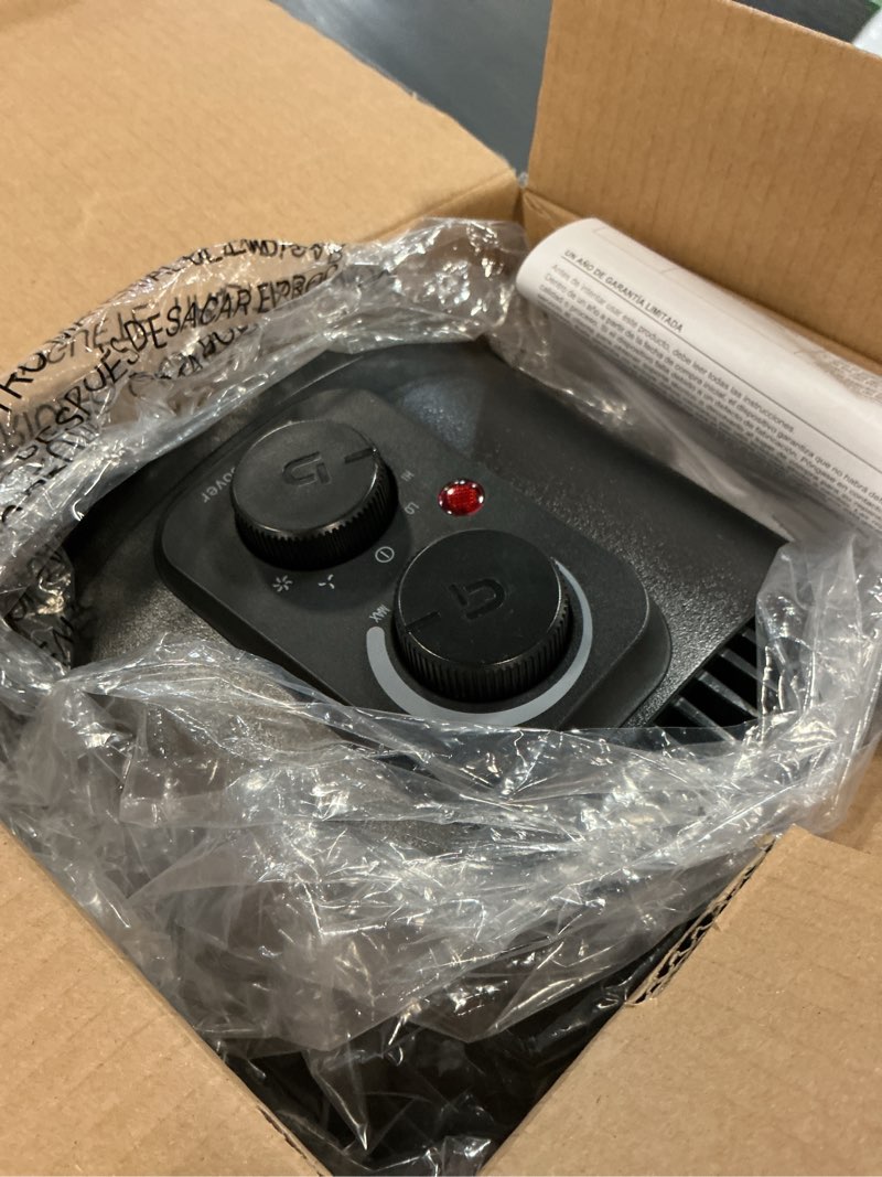 Condition photo showing As Is for Utilitech Electric Space Heater