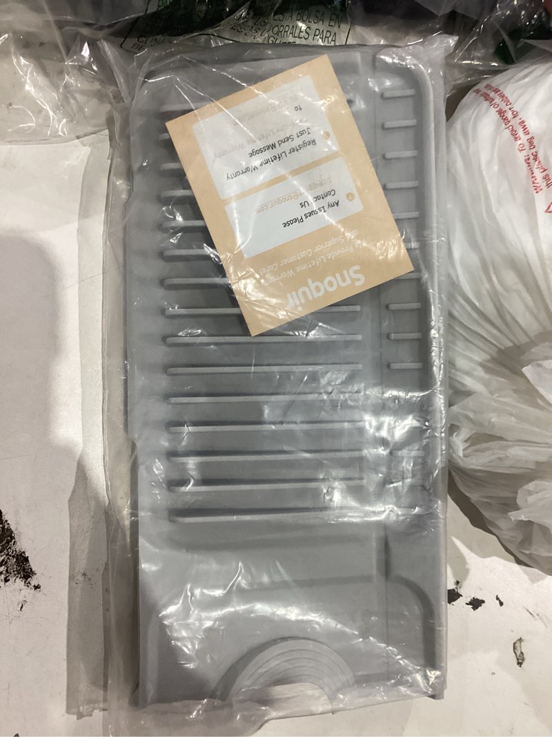 Condition photo showing As Is for Folding Faucet Mat for Kitchen Sink Splash Guard[7° Slope Fast Self-draining][Snap Lock Fit] Kitchen Sink Faucet Mat Splash Guard Kitchen Sink Area Sink Water Splash Guard Behind Faucet Draining Mat Light Gray 24" x 5.5"