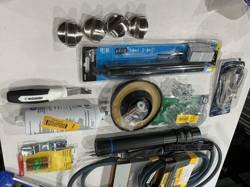 Condition photo showing As Is for assorted home improvement lot (small tools, screw, home accessories, etc.)