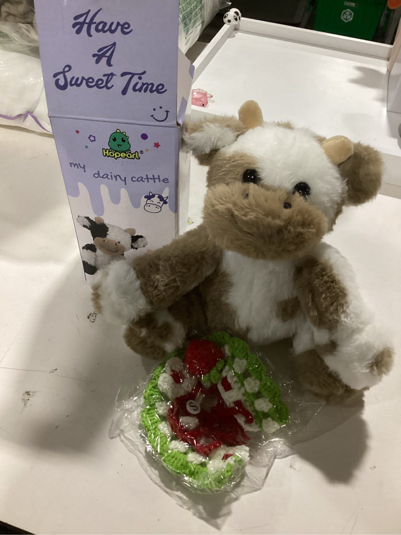 Condition photo showing New/Like New for Hopearl Adorable Plush Cow Toy with Knitted Cute Strawberry Bib Floppy Dairy Cattle Soft Stuffed Animal Gifts for Boys Girls Kids Toddlers, Light Brown, 9'' Strawberry Light Brown