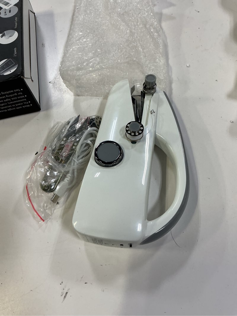 Condition photo showing Good Condition for handheld sewing machine,two dear,mini sewing machine,easy to use and fast stitch suitable for clothes,fabrics, diy home travel electric handheld sewing machine for beginner.grey