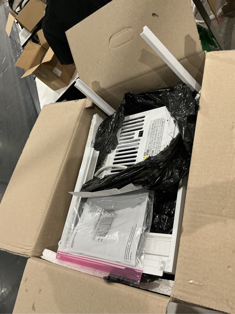 Condition photo showing As Is for amazon basics 5000-btu window air conditioner with quiet operation, up to 150 sqf, cool and fan functions, washable filter, adjustable window kit, intuitive mechanical controls, for small room, white white 5000 btu