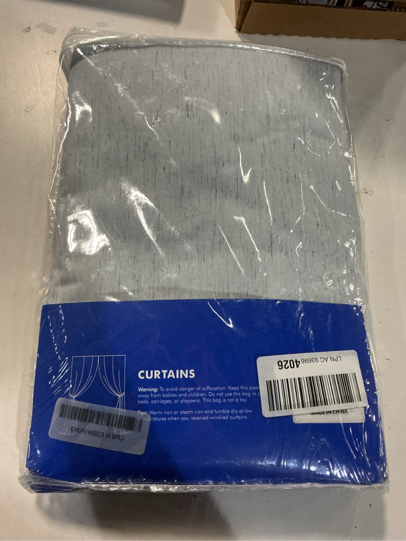 Condition photo showing New/Like New for miulee linen 100% blackout curtains 90 inch long 2 panels, back tab pleated hook belt rod pocket clip rings thermal insulated drapes for bedroom living room light blue modern black out window curtains light blue 52"w x 90"l (pack of 2)